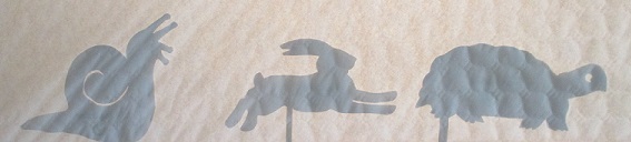 tortue, escargot, lapin en ombres chinoises theatre d`ombres marionnettes silhouettes